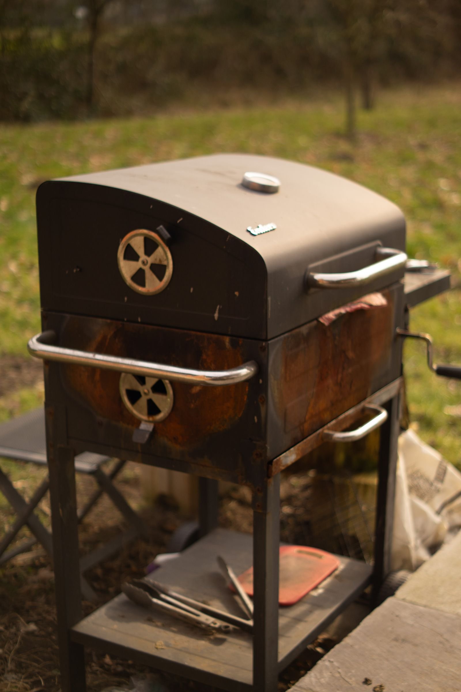 Barbecue smoker grill in a backyard