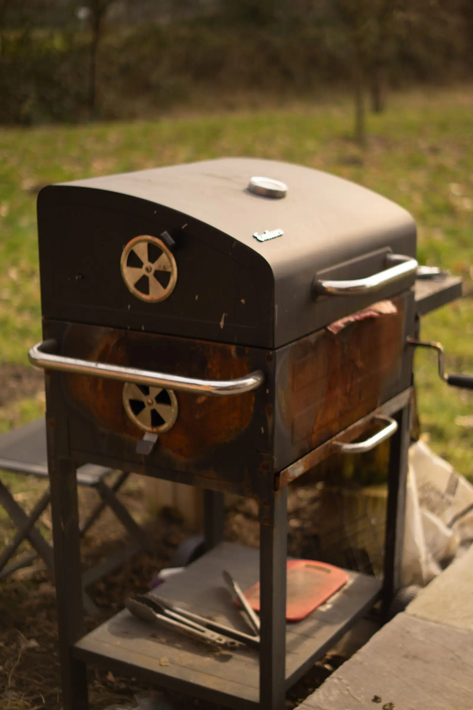 Barbecue smoker grill in a backyard